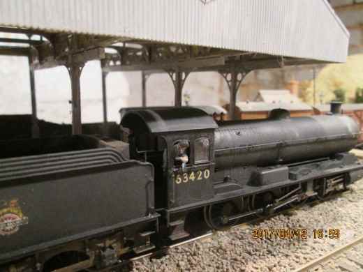 Hornby Q6 0-8-0 wouldn't be complete without crew. The driver whiles his time away at the starter signal - ModelU, see also below
