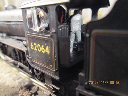 Hornby K1 2-6-0 waits at 'Thoraldby' platform, her driver (LNER engines were left-hand drive for the benefit of Scots' drivers, NER were right-hand drive (no need to leave their region aside from maybe Edinburgh or Doncaster). Fireman busy topping up