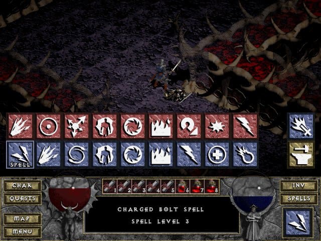 You can access the spell and scroll shortcut menu by clicking on the Spell icon in the lower right corner of the HUD.