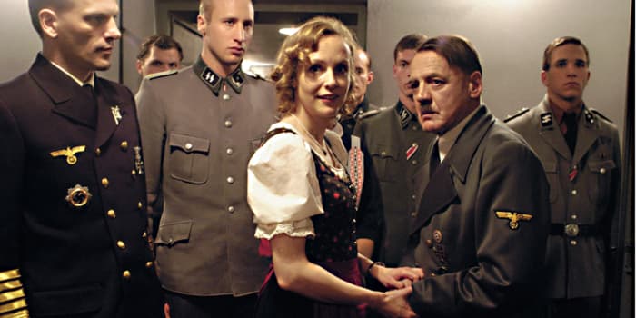 Juliane Kohler gives a truly accomplished performance as Eva Braun, here seen with Hitler and his entourage of generals and advisors