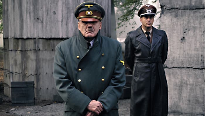 Bruno Ganz as Adolf Hitler and Heino Ferch as Albert Speer attend a medal ceremony for the defenders of Berlin - an authentic scene which in real life became the last captured film footage of the Nazi leader