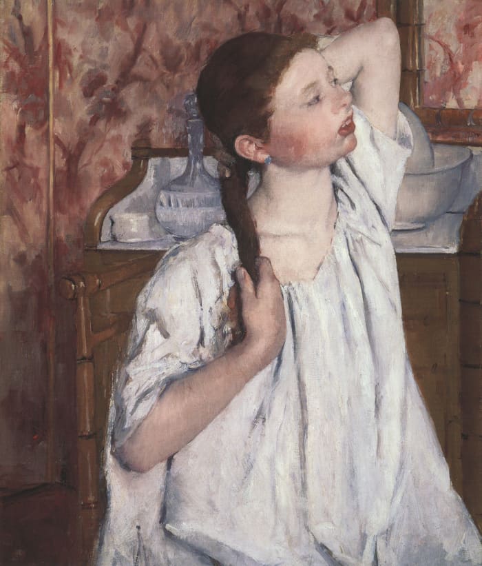 "Girl Arranging Her Hair," by Mary Cassatt, 1886, oil on canvas. National Gallery of Art, Washington D.C.