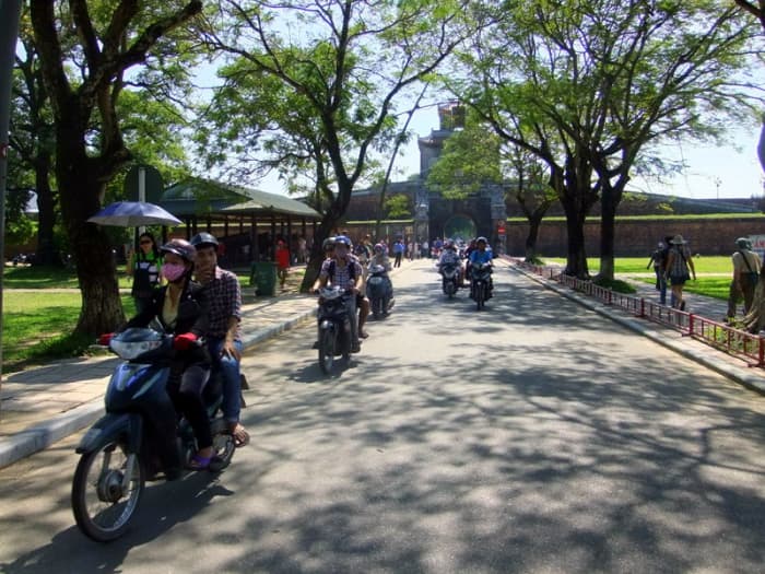 Streets scenes at the Imperial Citadel in Hue where heavy vehicles are not allowed within the compound.
