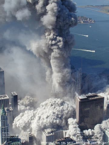 Later, both WTC 1 and WTC 2 collapsed producing what appears like a pyroclastic flow. Both buildings collapsed into their own footprint.