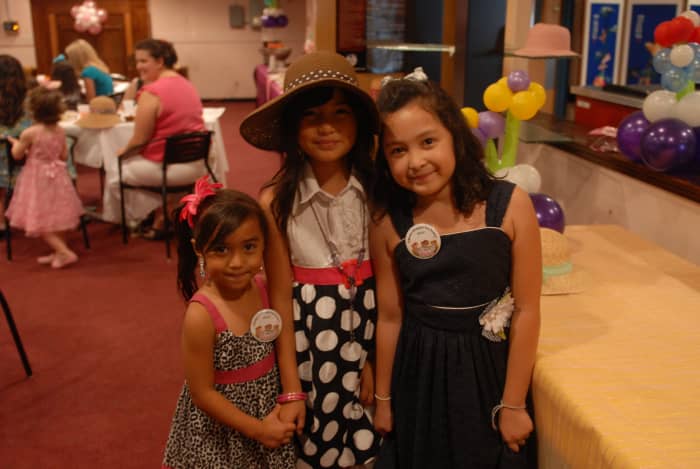 adding a little makeup will complete a look when dressing up like these little girls did for a mommy and me tea party.