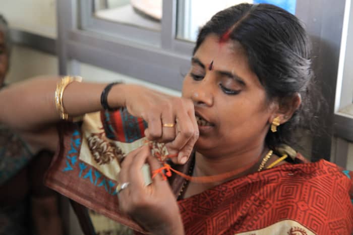 "The thread was wrapped around the gold pendant which was buried in the sweet." Meenakshi shows how it exactly was.
