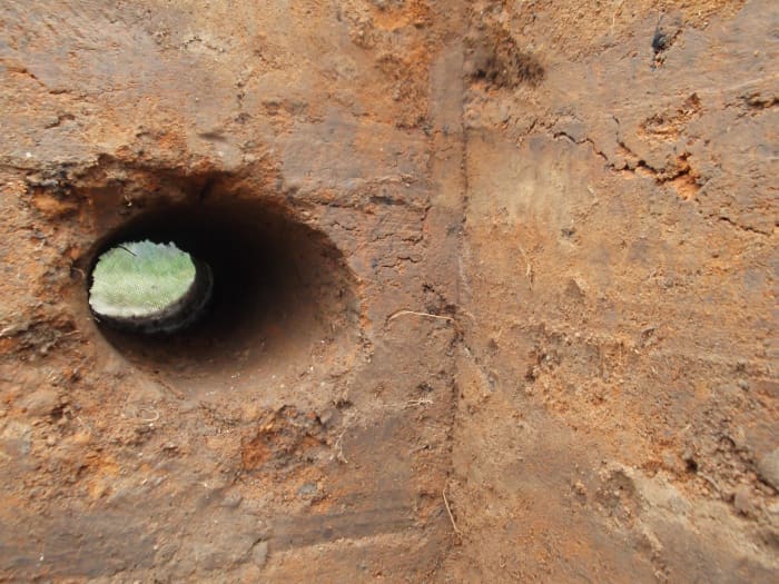 On the inside, we have sufficient room to stuff the hole with wet fabric or even with mud during a fire. At other times, the air can flow through without bugs or snakes coming in to our safe haven.