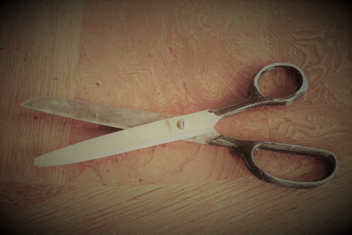 Be careful when trimming your own hair, and if possible, go to a beauty shop that you trust so that your hair will grow out the way you want it too.