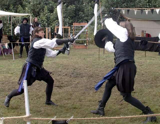When we learn combat, only an opponent who does her best to defeat us really helps us, as we see in this photo from the Prima Spada School of Fence in Australia.