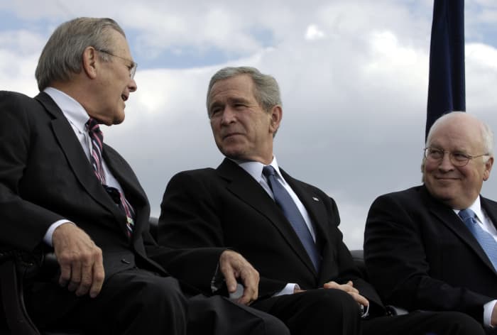 L to R: Secretary of Defense Donald Rumsfeld, President George W. Bush, and Vice President Dick Cheney