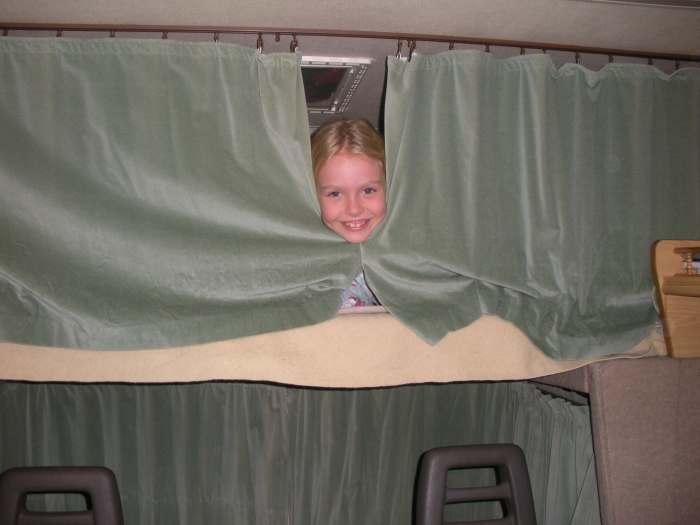 Any wee lassie or laddie looking for Nessie at the loch needs a warm, comfy bed for the night. :) The dining area in our RV converts into a double bed for adults, with room for kids in the upper bed.