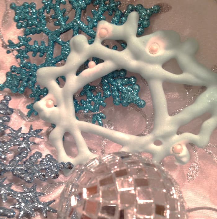 Besides baubles, snowflakes are one of the most popular ornament shapes on a decorated tree.