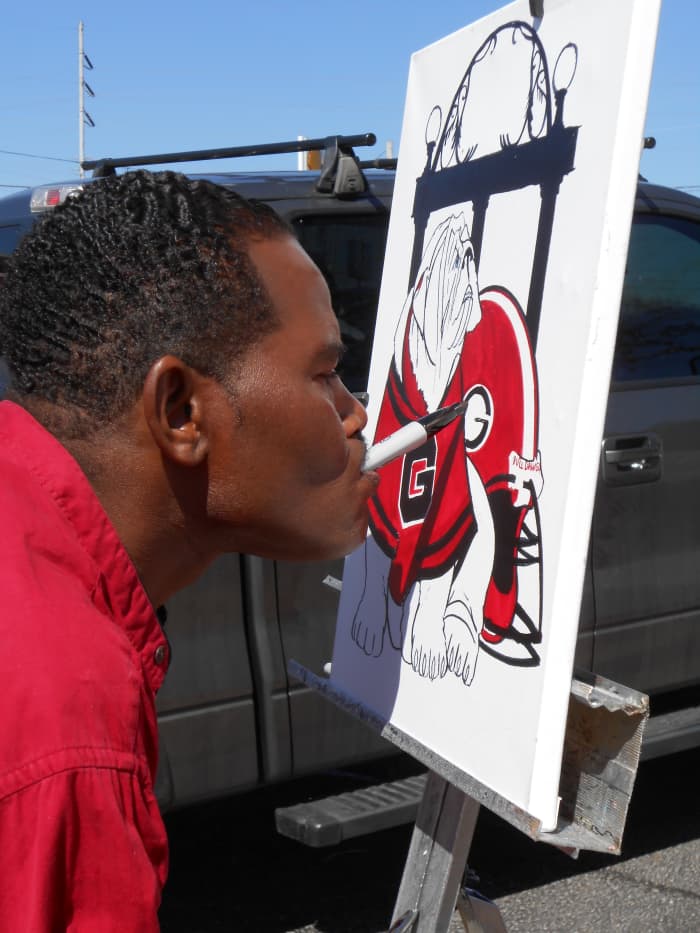 "I don't let things upset me. I figure God don't make mistakes," Davenport says. Davenport named this drawing "Baby Blue-Eyed Russ" after the University of Georgia mascot Uga IX.
