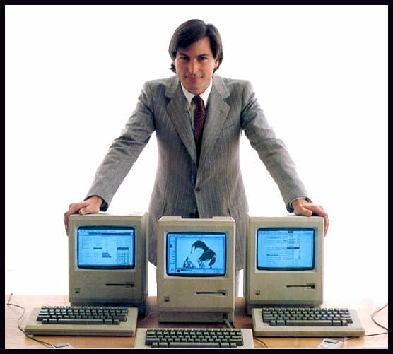Steve Jobs with Macintosh in 1984. The Mac had a high price tag and low sales.