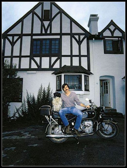Steve Jobs in front of his new home in Los Altos, CA @ 1980. A home that would remain unfurnished for many years. It is now abandoned in danger of demolition