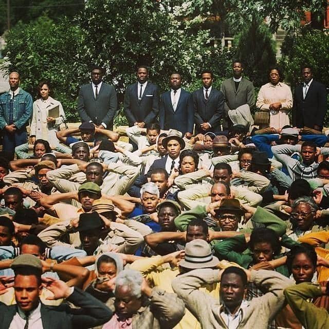 Troy in the cast from the Civil Rights movie on Martin Luther King and the march in, "Selma" with Oprah Winfrey. (That's Troy in the Green hat, center-left).