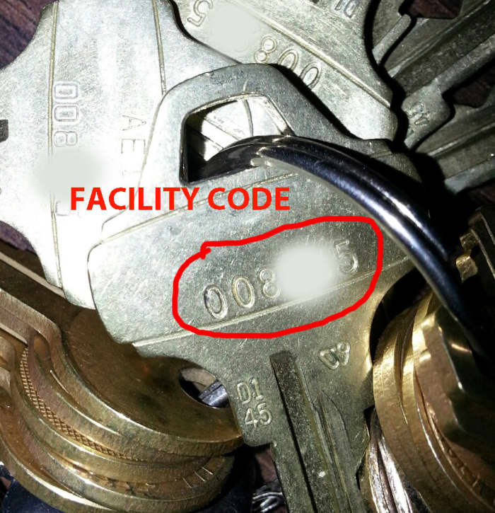 Schlage Everest "D Family" Restricted Key, facility code number partially masked.