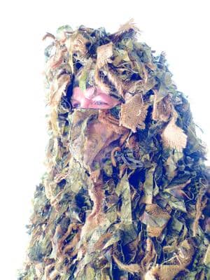 Ghille suit is a form of camouflage that has it's roots in Scottish folklore. Scottish swat teams wear this suit when working in the forests in Scotland.