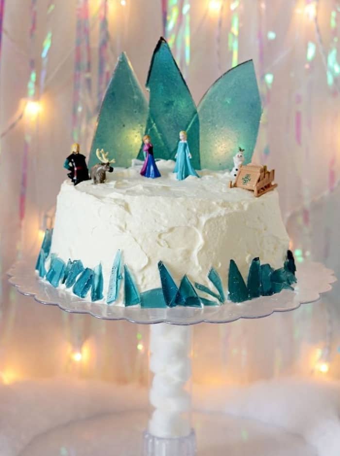 A frozen birthday cake with the beautiful ice palace