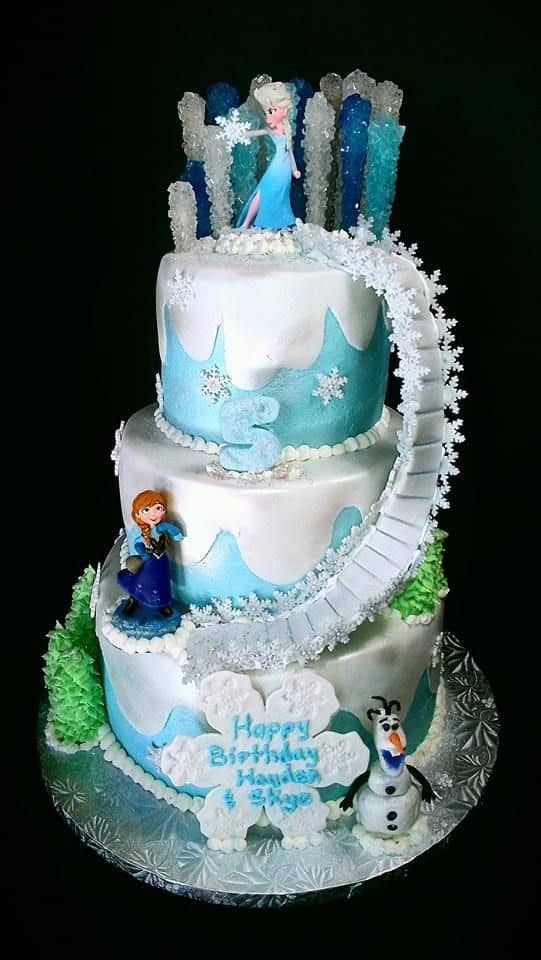 A Frozen themed birthday cake showcasing Elsa's power
