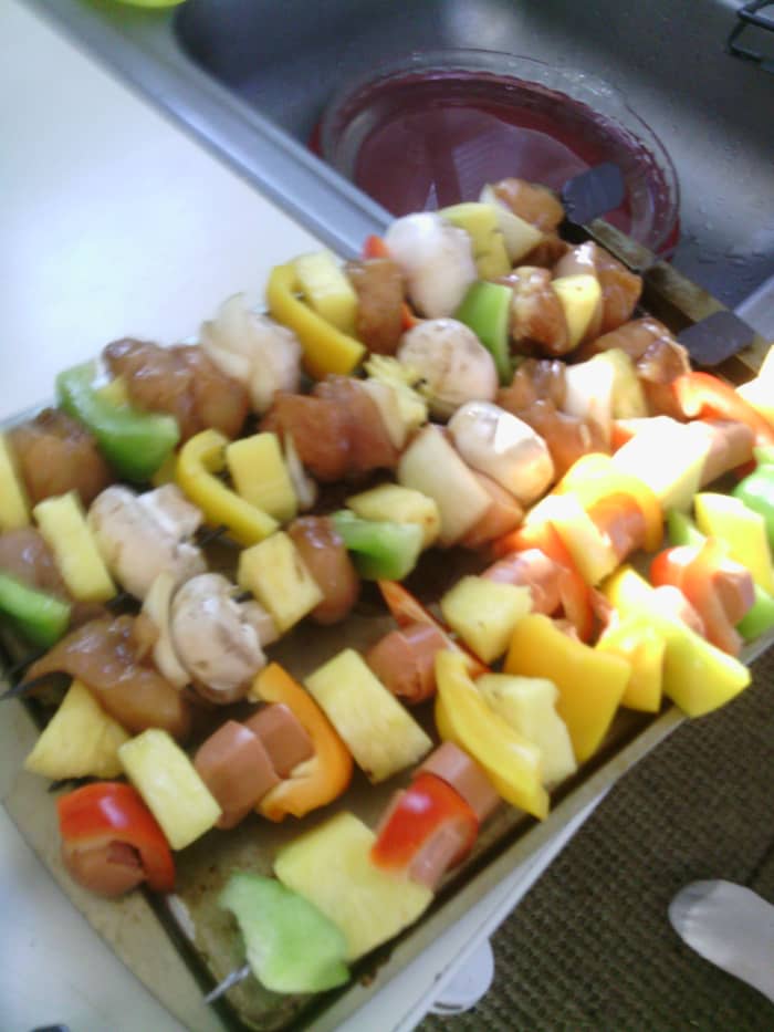 Chicken and my sons hot dog shish kebabs, even though hot dogs are not traditional it was a good way to get my son involved in cooking and eating his own meal.