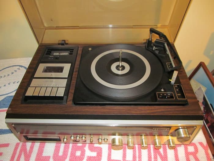 The Zenith integrated stereo system model “IS-4041” is made up of a turntable, a deluxe AM/FM stereo receiver, cassette single deck, and stereo 8-track player.