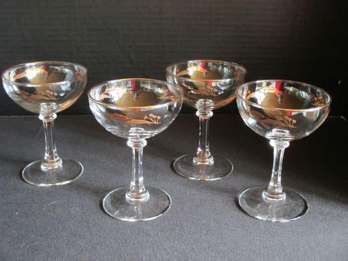 Four vintage Lifetime Prairie Gold Wheat sherbet champagne goblets stemware glasses. These goblets are 4-3/4" tall x 3-1/2" diameters at the rim and they each can hold four ounces.