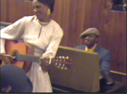 Take Me Back to Beale (Book I) depicts Memphis Minnie performing on Beale Street in the 1920s.