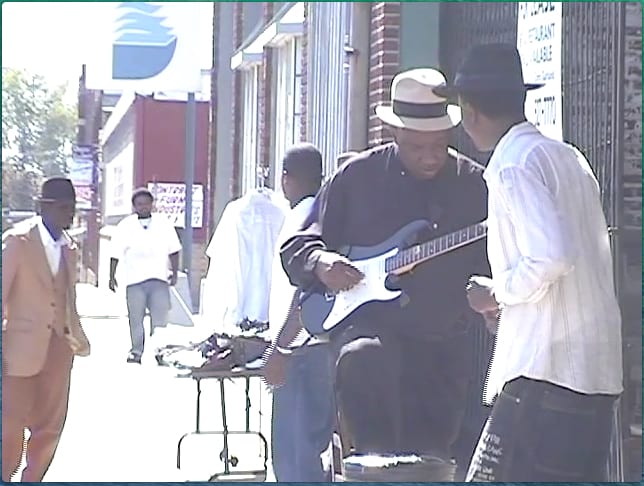 Beale Street was vibrant and filled with music as seen in this 1940s depiction from Book II of Take Me Back to Beale.