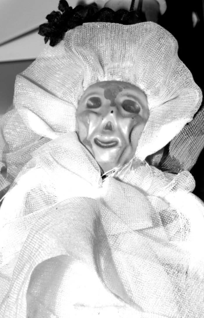 My La Santisima is very proud of this doll. It isn't her per se, but the Polish form of Death, Śmierć, is said to be a female skeleton who wears a white robe, and I am part Polish, so she insists we were meant to be.