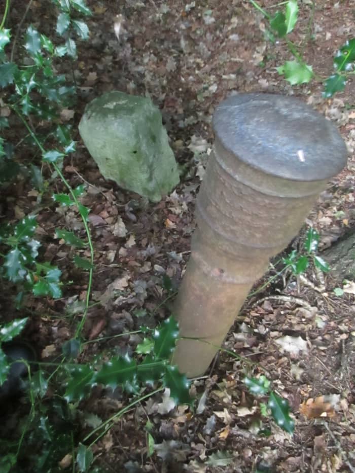 In the shadow of Snaresbrook Crown Court I found this oddity. I'm told it's where there was a power point for an Anti Aircraft Battery in WWII. The stone beside it is a boundary marker