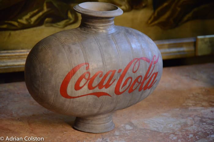 Ai WeiWei's work is political, as you can see, this is his way of criticizing the way modern corporate culture is trampling the ancient glories of historical China.