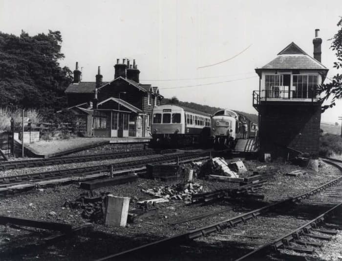 Castleton Station in the 1960s. A Whitby-bound dmu stands at the 'Down' platform, a visiting Deltic diesel at the 'Up' - is this the year Whitby Town FC qualified to play in the FA Cup Final at Wembley?