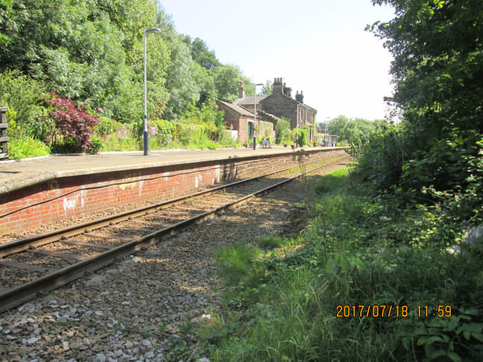 The single brick-faced platform (infill behind) with its stepped gable-ended building characteristic of stations around Eskdale - including Glaisdale and Lealholm on this branch, Goathland on the NYMR