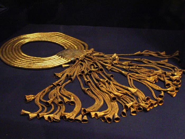 A gold and lapis lazuli collar of king Psusennes I found in his tomb at Tanis.