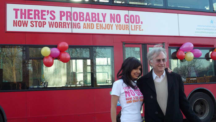 The biologist Richard Dawkins with comedian, and journalist, Ariane Sherine at the launch of the Atheist Bus Campaign. The campaign began in London, and used the slogan: ""There's probably no god. Now stop worrying and enjoy your life."
