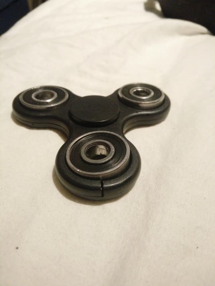 My plastic tri-spinner. After just two drop-tests the plastic cracked and deformed in such a way that the ball bearings in the prongs don't fit properly any more