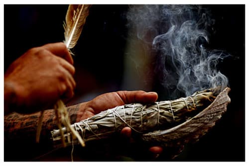 Smudging with sage by Native Americans calls on the spirits of sacred plants to drive away negative energies and restore balance. It has been a part of Native American tradition for thousands of years.
