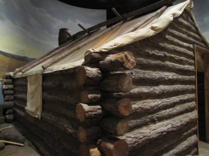 I saw this example in a Civil War museum which shows a log structure with a canvas roof.