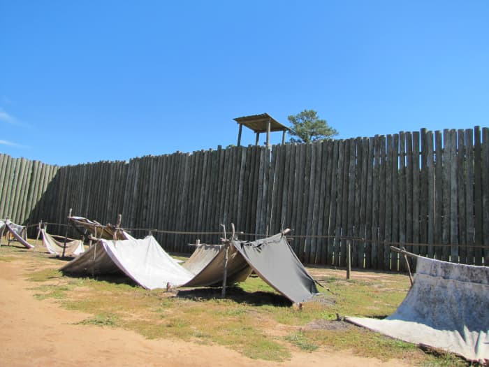 This reconstruction shows how prisoners of war created shelters for themselves in Andersonville Prison in Georgia. The lucky ones used canvas to form tents and a few even got some wood for slightly larger structures. The majority lacked any shelter.