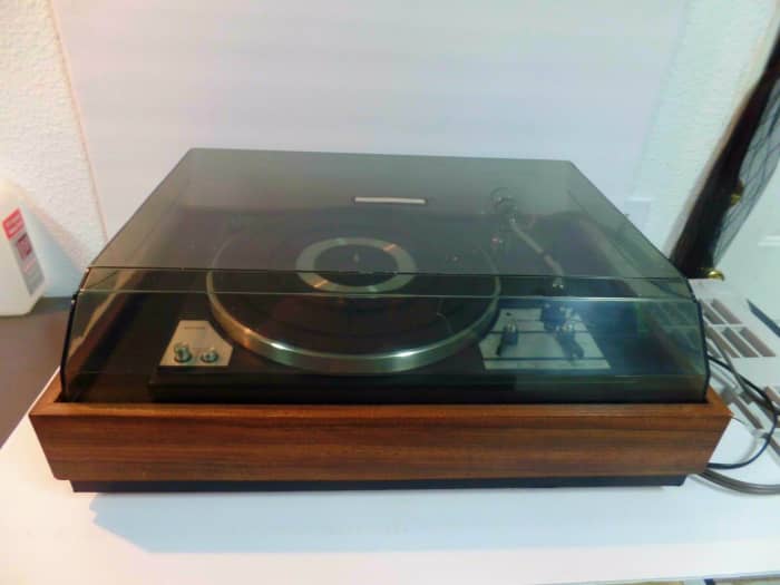 The tinted acrylic cover not only protects the unit from dust, but is durable and lovely to look at. It has a pewter finish to blend in perfectly with the chrome pieces of the turntable.
