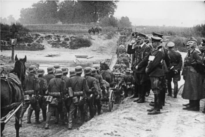 Hitler greets troops on the attack in Poland. He would follow the invasion from his command train near the front-line during the invasion.