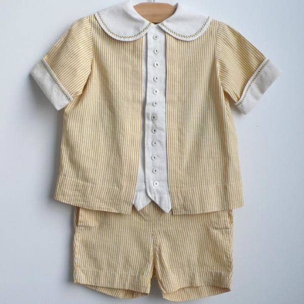 "Belle Heir" yellow + white short set c. 1920 a finely tailored and hand detailed striped short set. top is finished with unique embroidery along the collar and sleeve cuffs. shorts have buttonholes with twill belt. top measures Ch: 10: