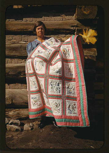 Mrs. Bill Stagg with state quilt, Pie Town, New Mexico (LOC) Photographer: Library of Congress Licensing Agreement: Public Domain
