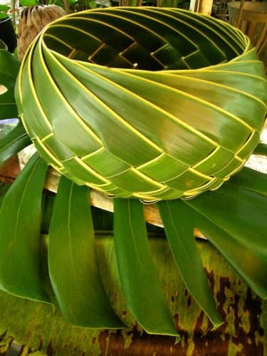 Not necessarily. This palm frond bowl from Hawaii is both practical and useful. Made by a native Hawaiian, from local materials, using traditional techniques, it is folk art.