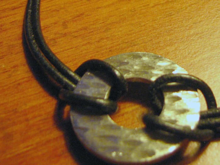 Collecting odd things can help if you have a creative spirit. This bracelet I designed was a very rusty washer before I went to work on it.