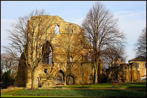 Knaresborough Castle is in Yorkshire. It belonged to John of Gaunt, and is still part of the Duchy of Lancaster today. The King's Hall, shown in this photograph, was built during the 14th century, possibly by John. Copyright Tasa_M.