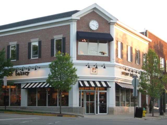 The busiest intersection just south of the tracks in Downtown Hinsdale where the Corner Bakery occupies the corner is quiet after the shops close