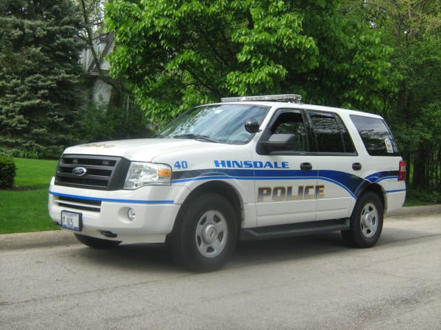 Hinsdale's very trusting "finest" leaving a vehicle parked and unattended with the windows down along a side street
