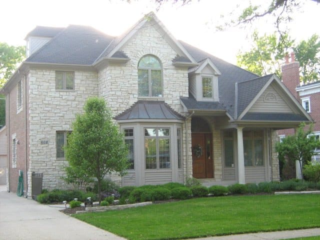 Strange block-fellows: this grand home is across the street from the house pictured above - with some owners upscaling and others not, this is what is found along some blocks near the north end of Hinsdale